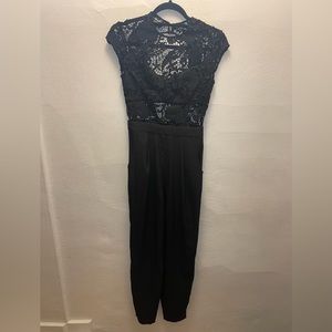 Bebe , Black lace jumpsuit, size 2